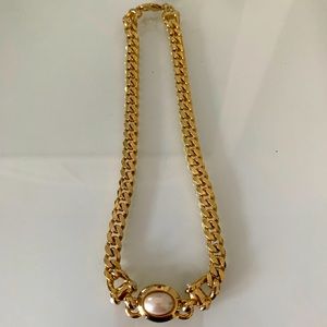 Goldtone choker with pearl center